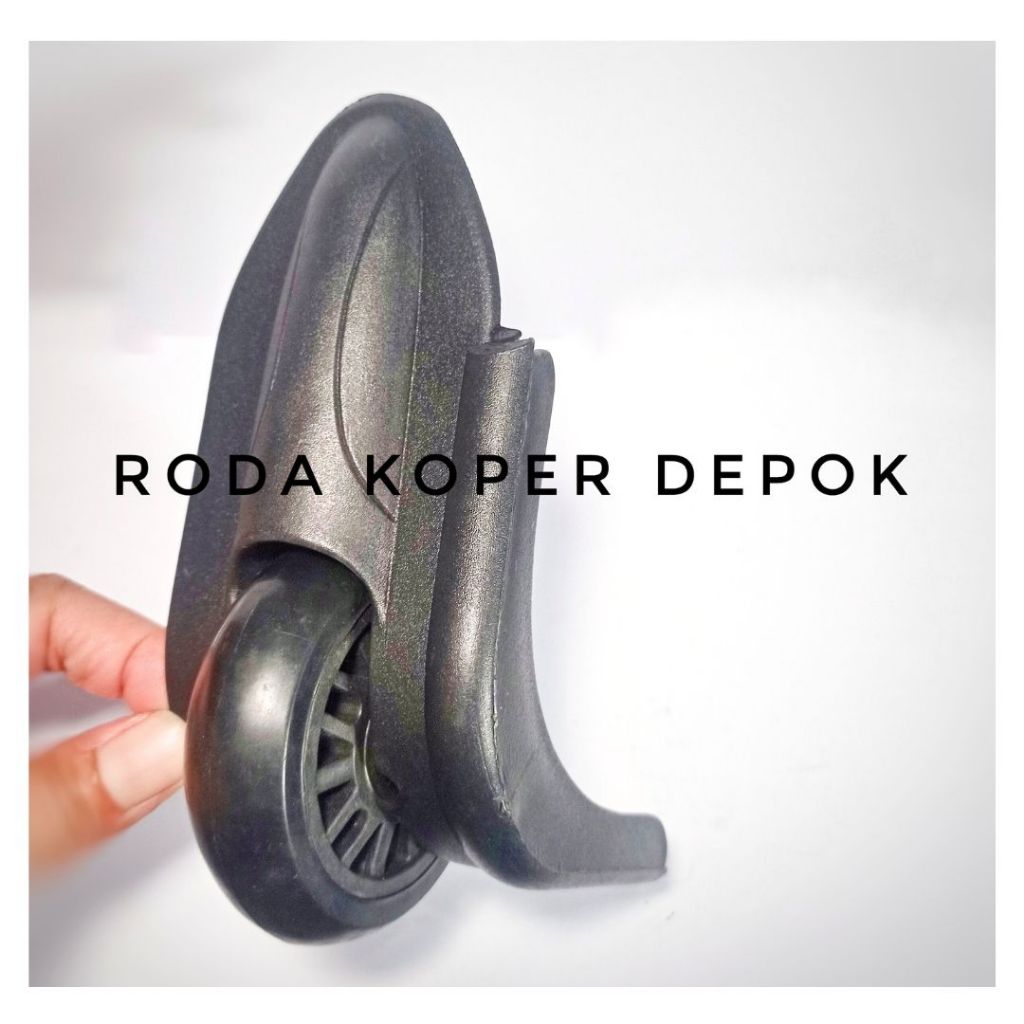 Dudukan roda koper belakang