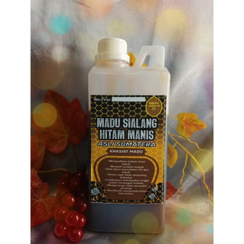 

madu Sialang hitam manis 1kg