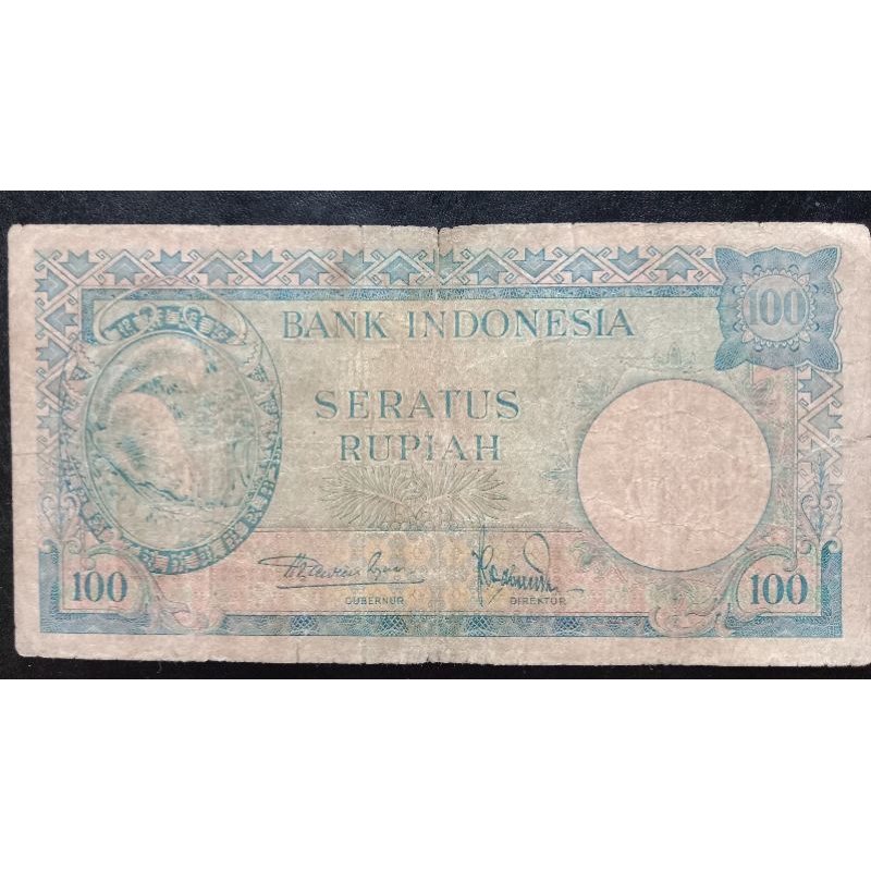UANGKUNO 100 RUPIAH TUPAI THN 1957