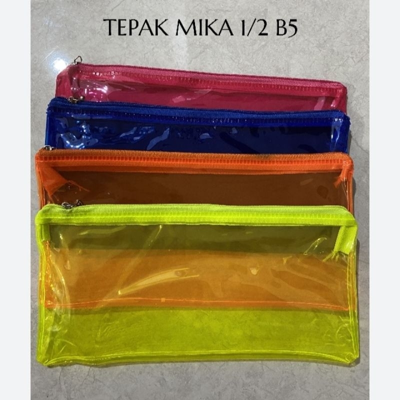 

Tepak pensil transparan resleting