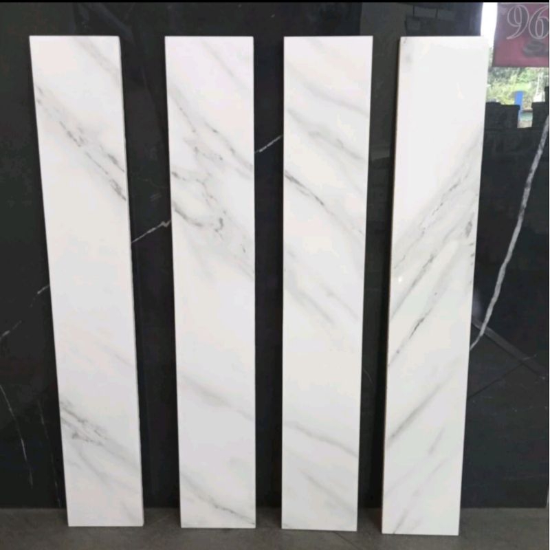 granit keramik list/plint 10×60 motif putih carara ukuran request cuatom