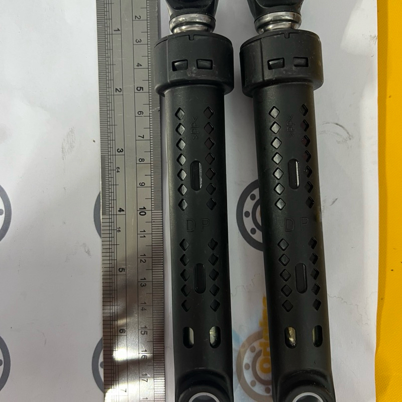 Shock penahan drum mesin cuci