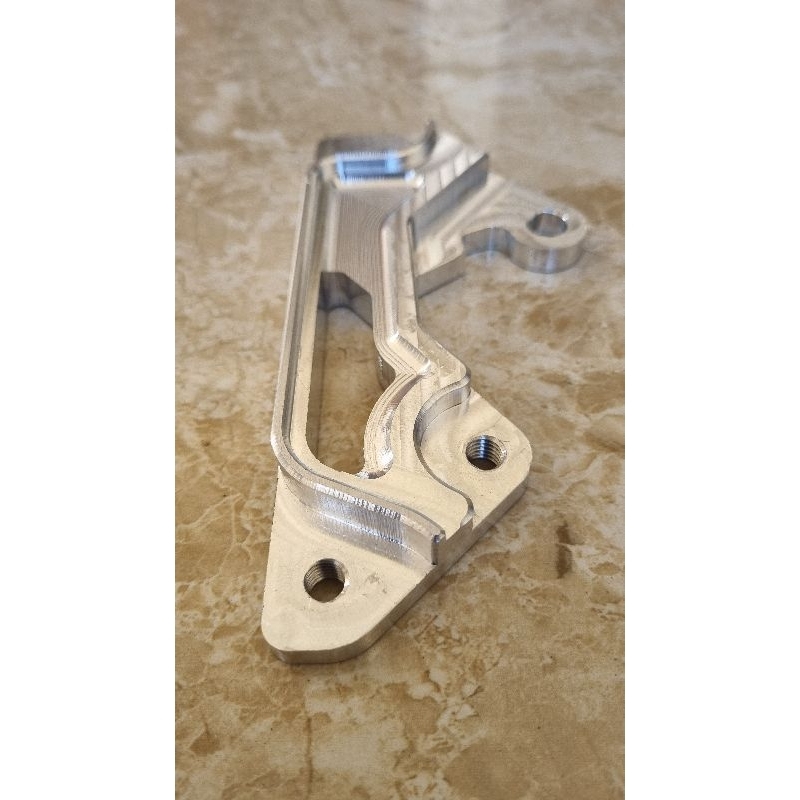 BREKET KALIPER PCX DISC 260