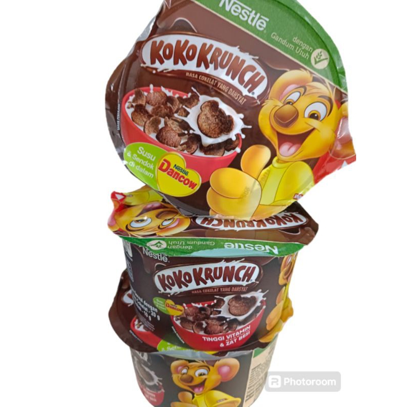 

Nestle koko krunch sereal dengan gandum utuh dan coklat 20gr dancow susu bubuk 10gr