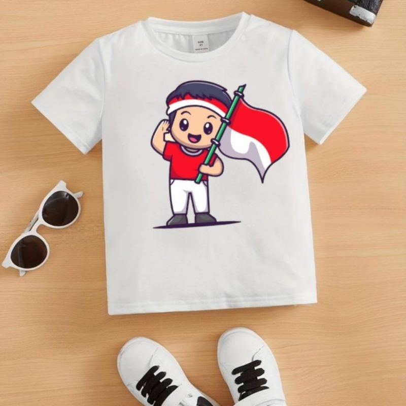 Kaos atasan anak kemerdekaan Indonesia merah putih HUT RI ukuran 1-10 tahun gambar cowok hormat bend