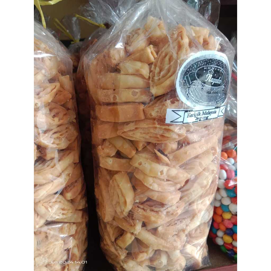 

1BAL ISI 1KG PANGSIT LIPAT KUE BAWANG GULUNG SAJIAN BESAR