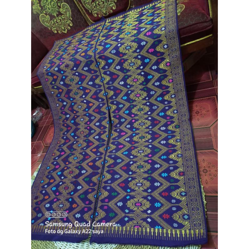 Kain songket tenunan