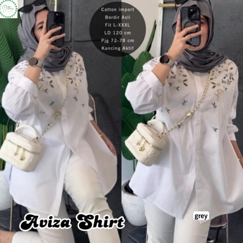 Blouse/atasan/kemeja/Hem wanita warna putih bahan katun