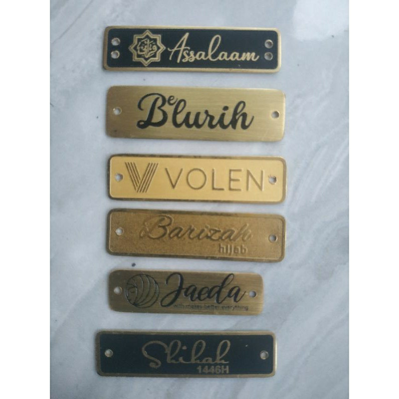 label plat hijab besi