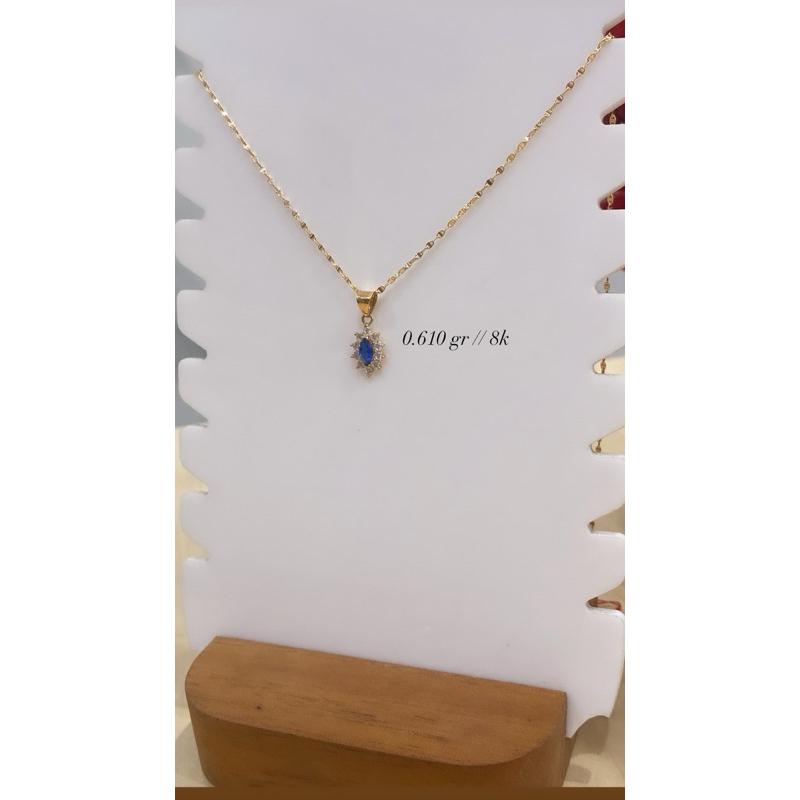 liontin cor ad mata biru