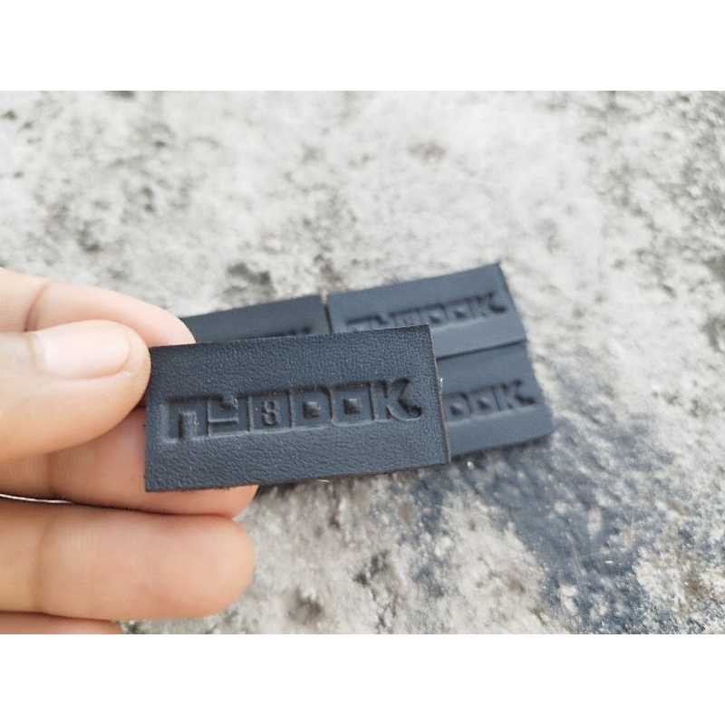 

label kulit imitasi label kulit label tas label jeans label denim label embos