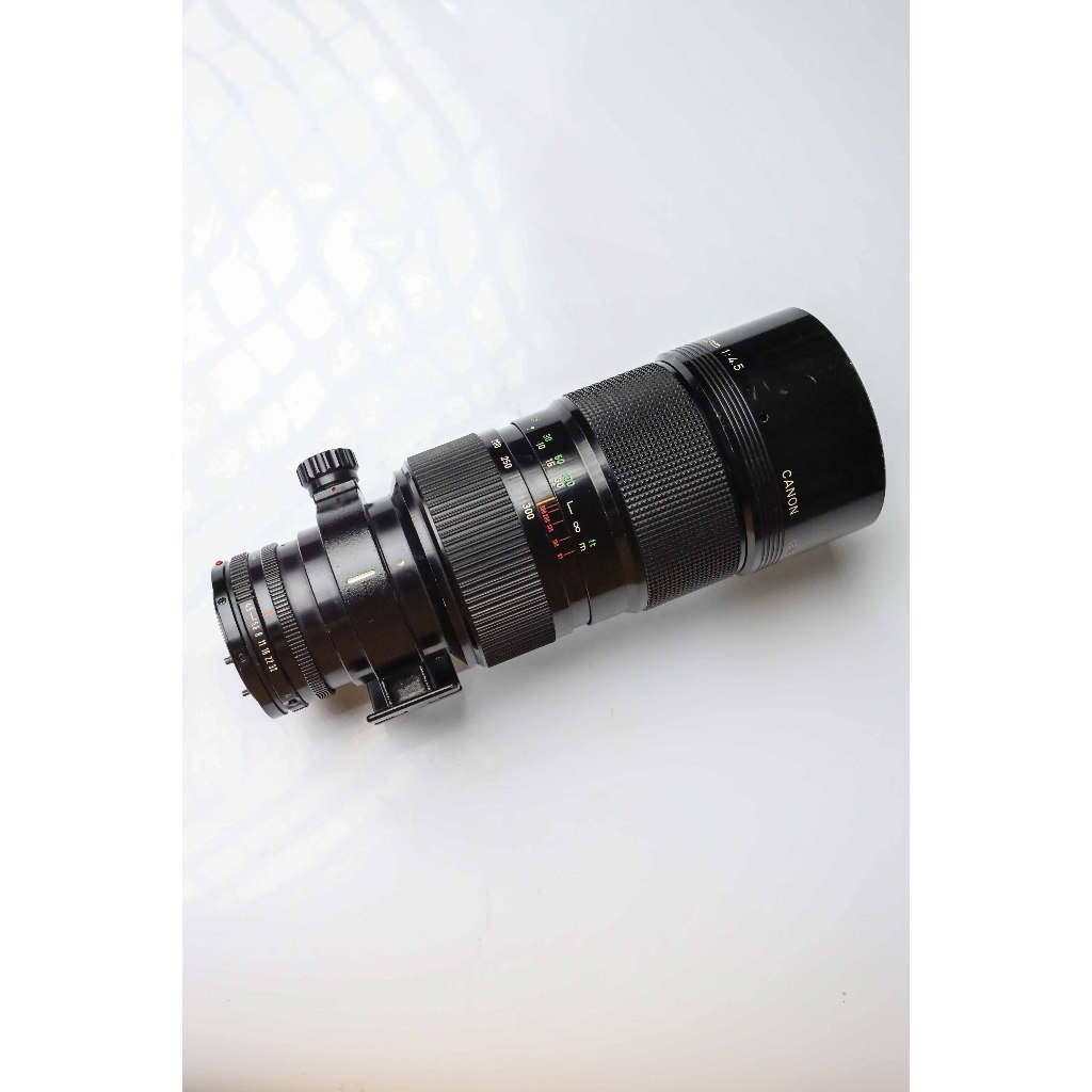 Lensa Manual Canon New FD 85-300mm F4.5 Mulus Normal  Jarang ada