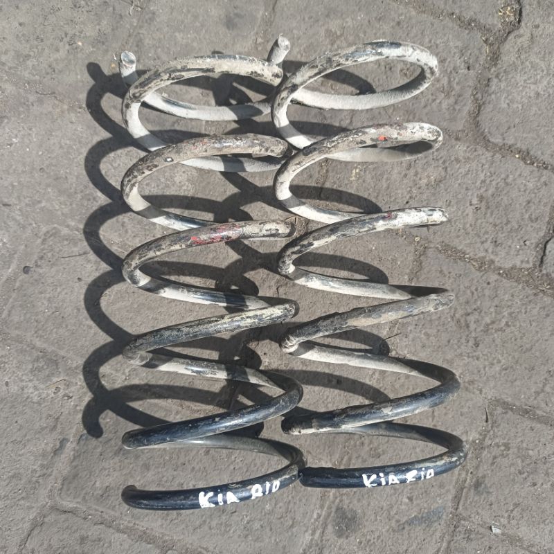 spiral coil spring per kia rio depan kanan kiri original