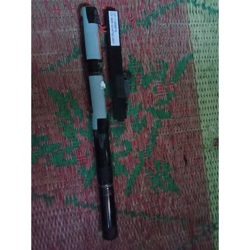 baterai laptop axio tnh