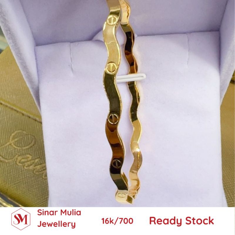 Gelang oval Cartier gelombang
