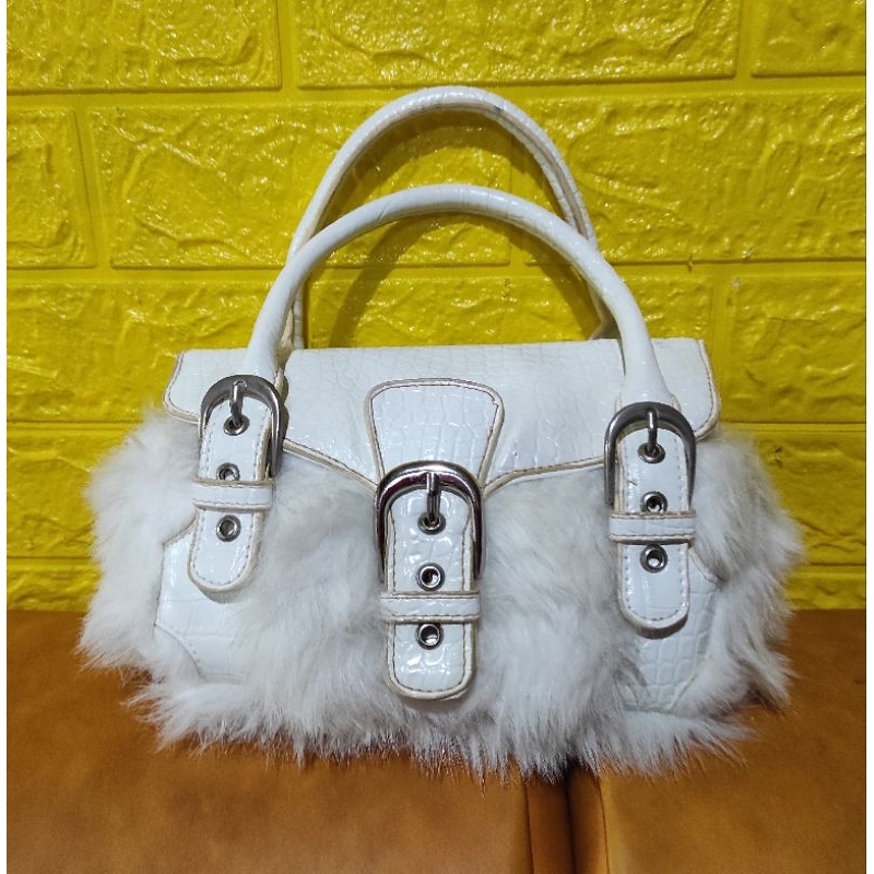 tas pesta cimit bulu