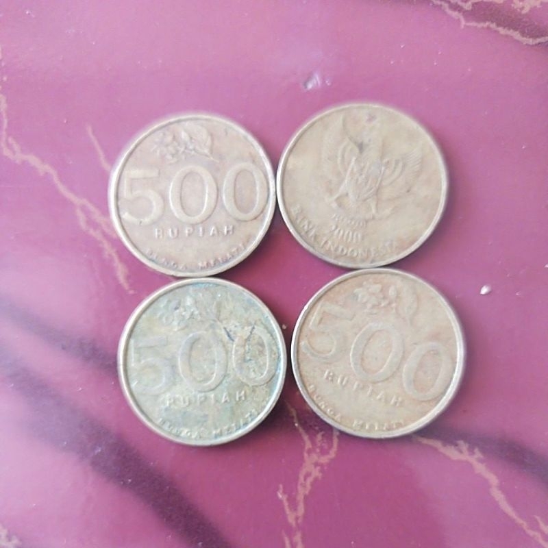 Uang koin 500 kuning bunga melati