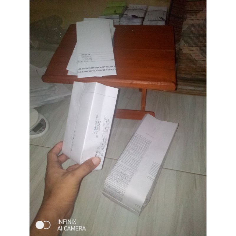 

KERTAS BUNGKUS GORENGAN (KECIL 250 GRAM 50 PCS)