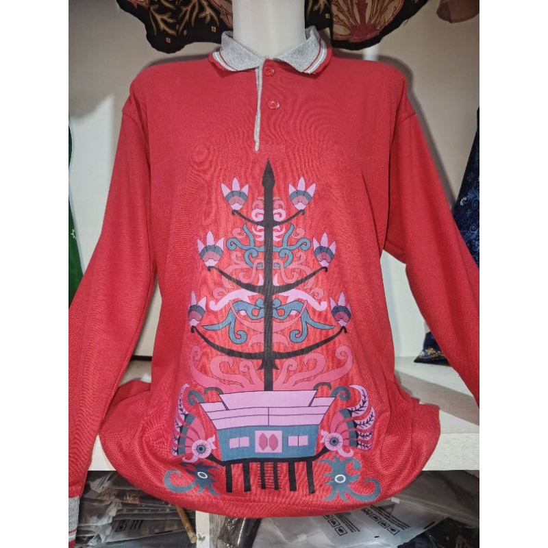 Baju kaos polo motif batang garing khas Kalimantan Tengah
