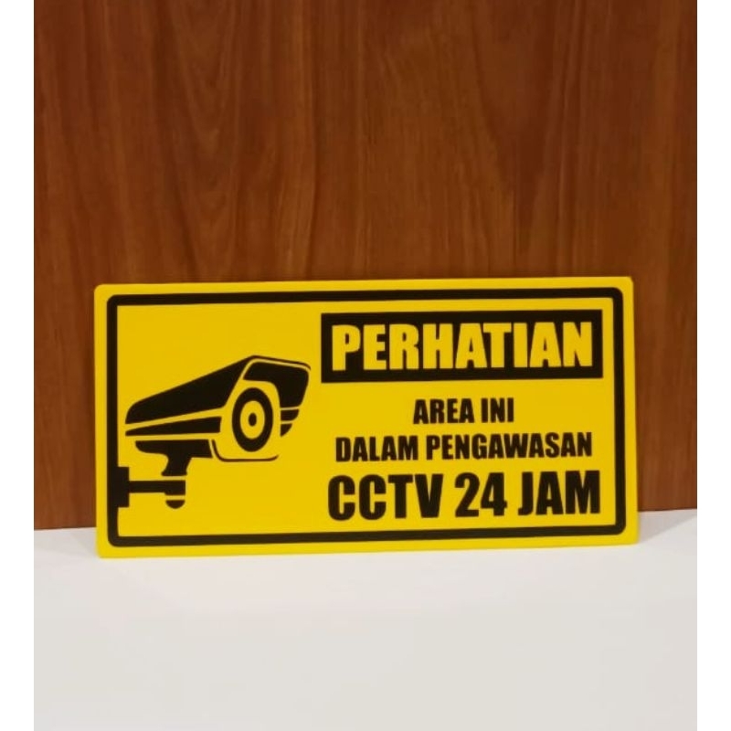 

Sign " PERHATIAN Aera Ini Dalam Pengawasan cctv 24 Jam" Sign label Acrylic