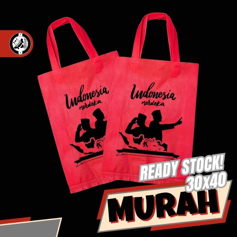 

Tas Goodiebag Tema Agustusan Kemerdekaan Size Besar Muat Banyak Sudah Di sablon gambar pahlawan 30x40x8 merah