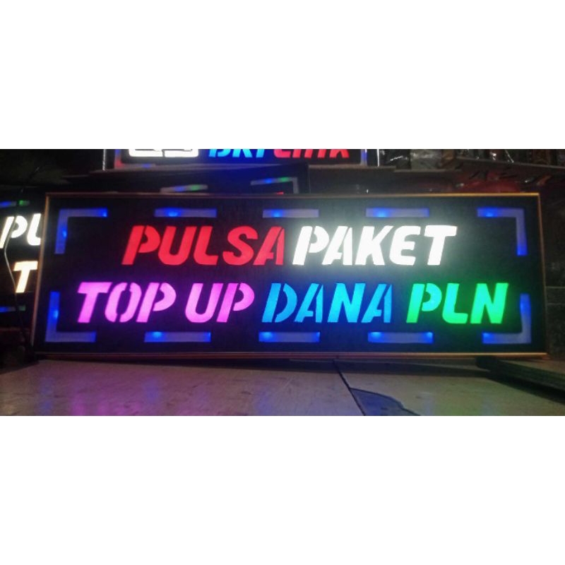 Lampu tulisan PULSA PAKET TOP UP DANA PLN