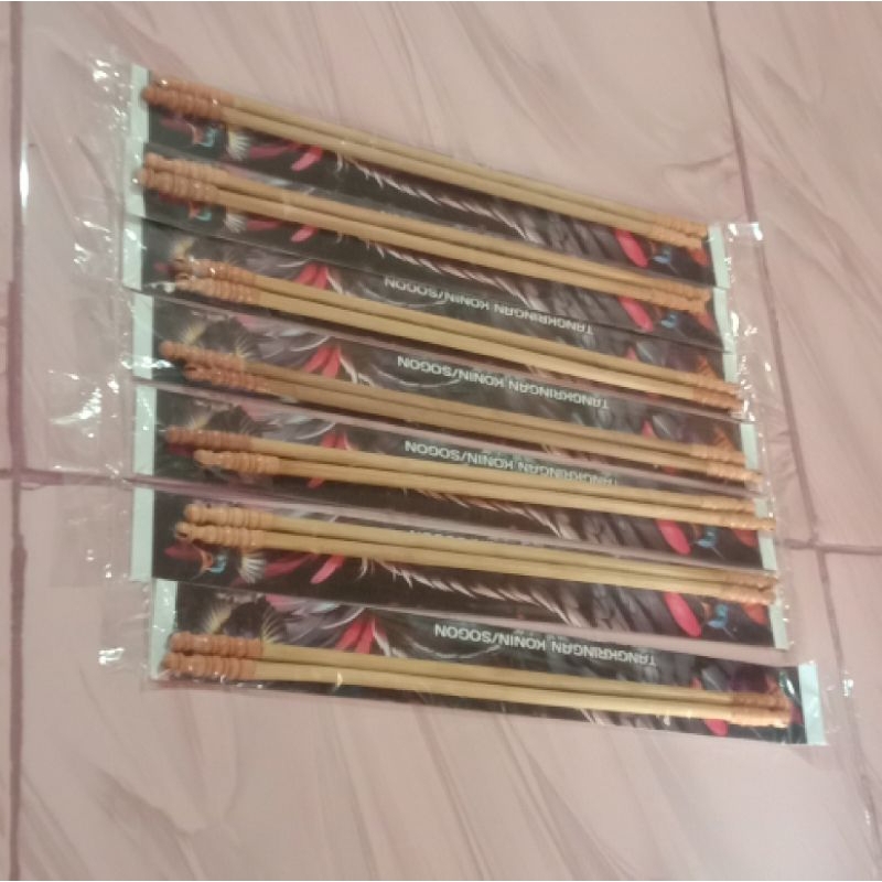 Tangkringan sogon konin ukir bambu