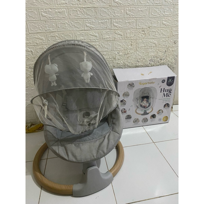 sugar baby bouncer hug me wood