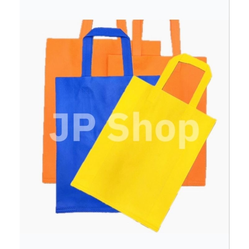 

Tas Spunbond 35x45x12 cm Tas Belanja Goodie Bag Polos Berwarna