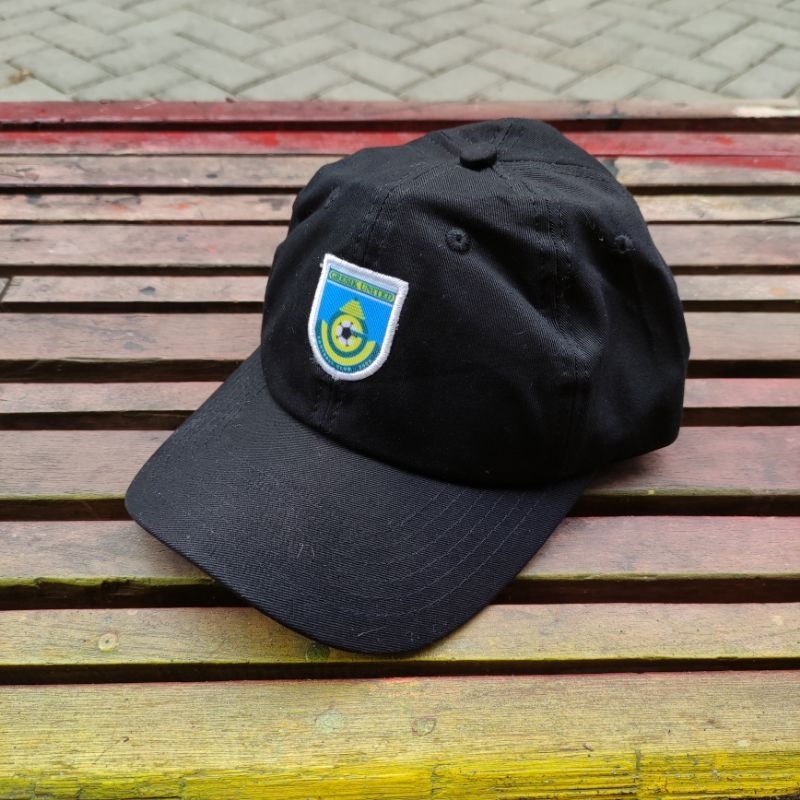 Topi gresik united logo