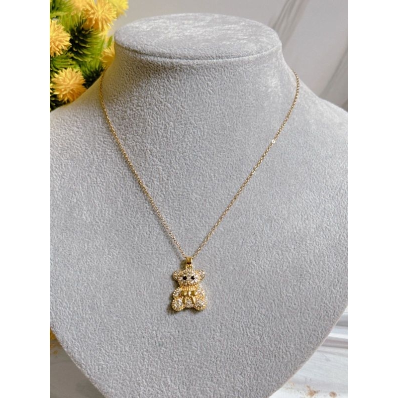 Kalung titanium set liontin boneka