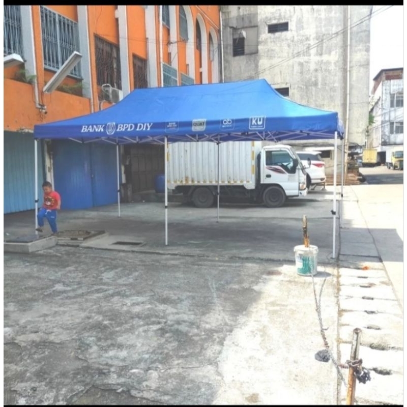 TENDA LIPAT UKURAN 3X6 PREMIUM ATAP KASTEM LOGO DAN TULISAN DI SABLON