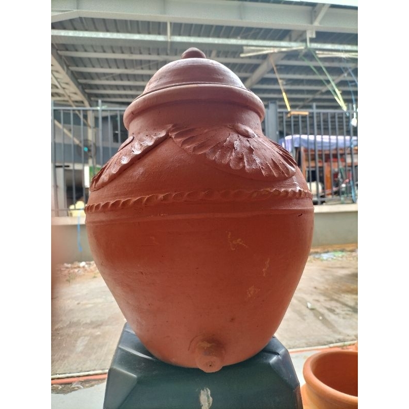 padasan wudhu tanah liat tebal kapasitas air 25 liter.