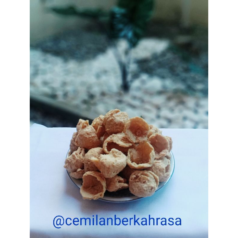 

KERIPIK TAHU BULAT /KULIT TAHU /KULIT TAHU WALIK 250GR