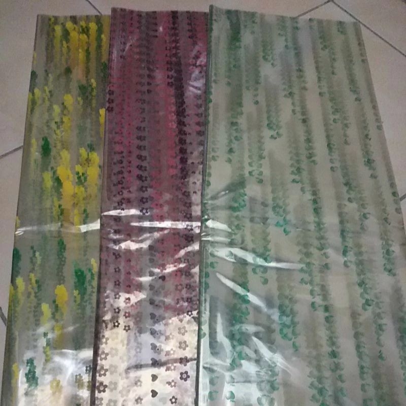 

Plastik kado/parsel bening motif