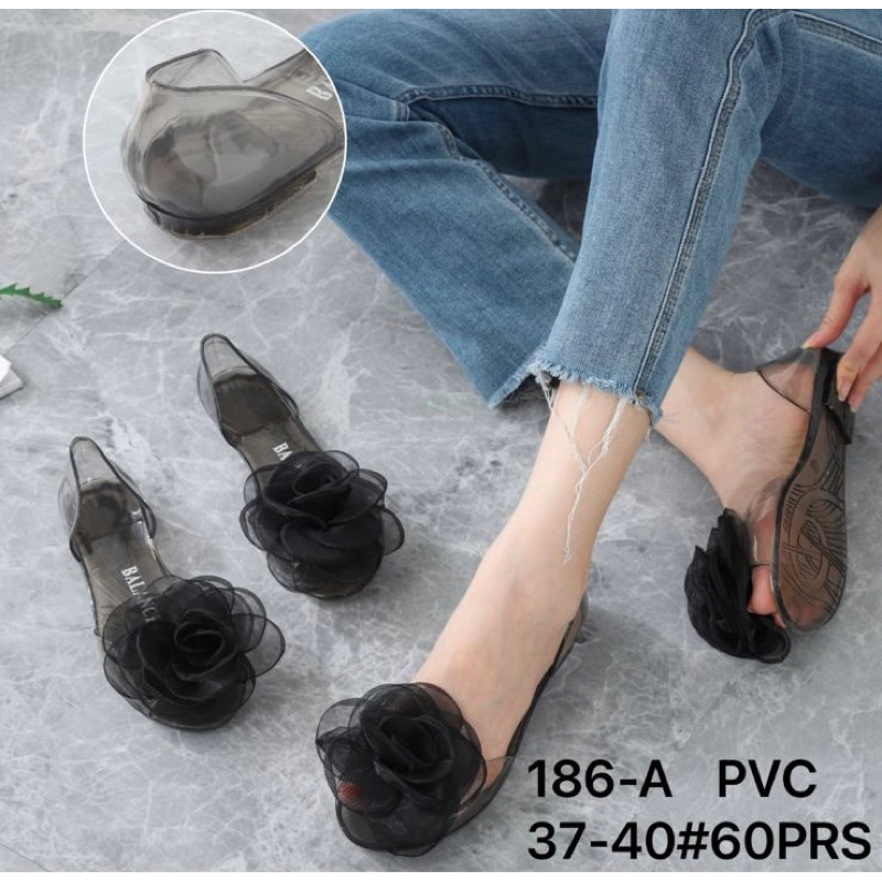 186 A Sendal Jelly bening bunga besar pita sandal import balance