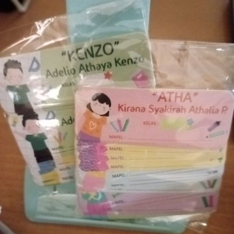 

Label nama Kirana Syakirah dan Adelio Athaya Kenzo