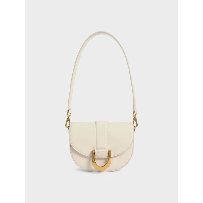 CHARLES & KEITH Mini Gabine Saddle Bag - Cream (PRELOVED)
