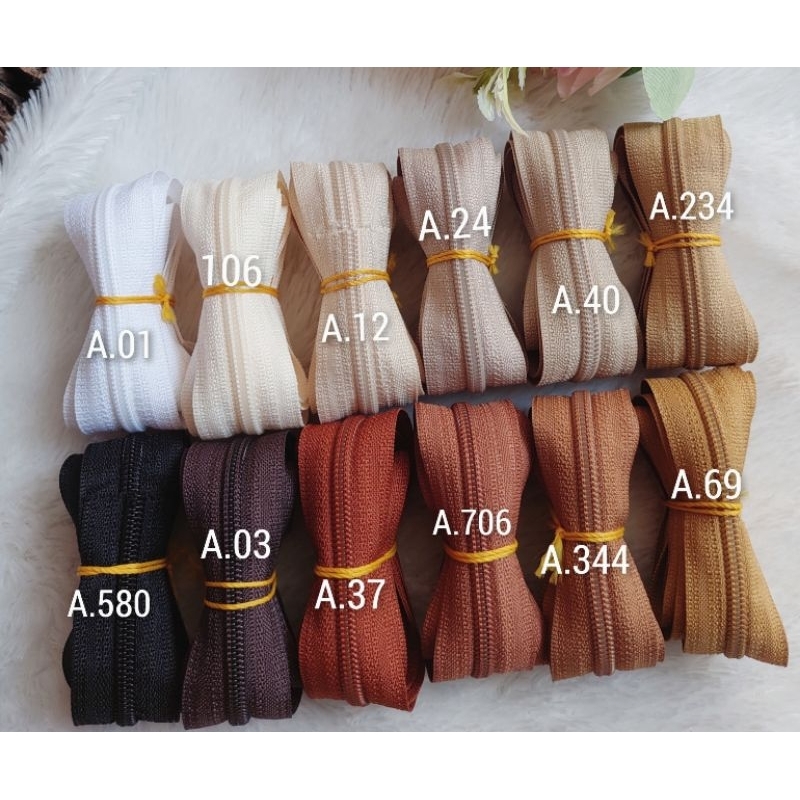 Retsleting amco No 5 plastik (satu roll)