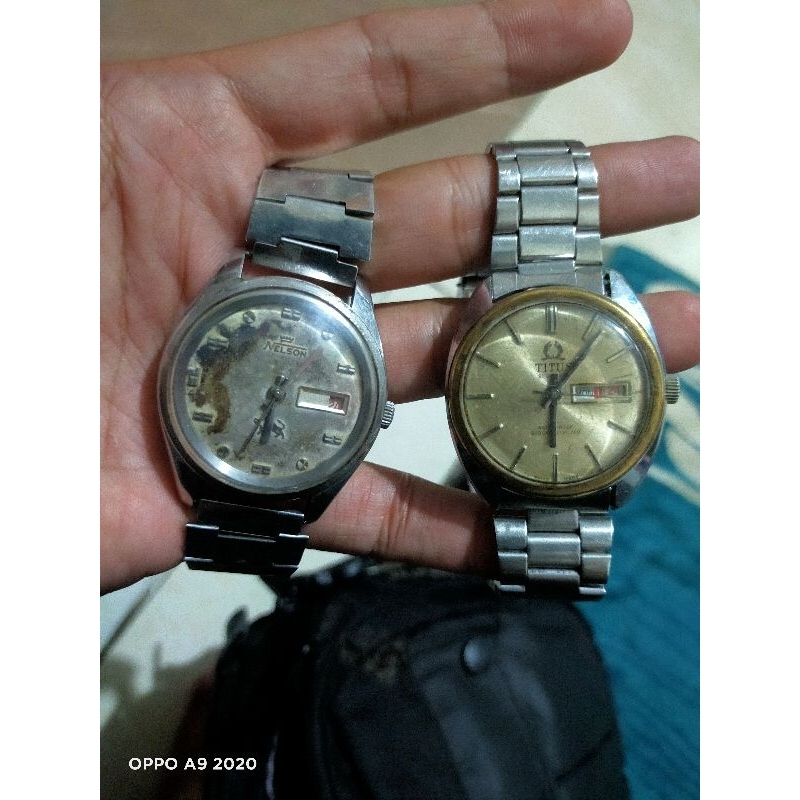 jam otomatis merk titus