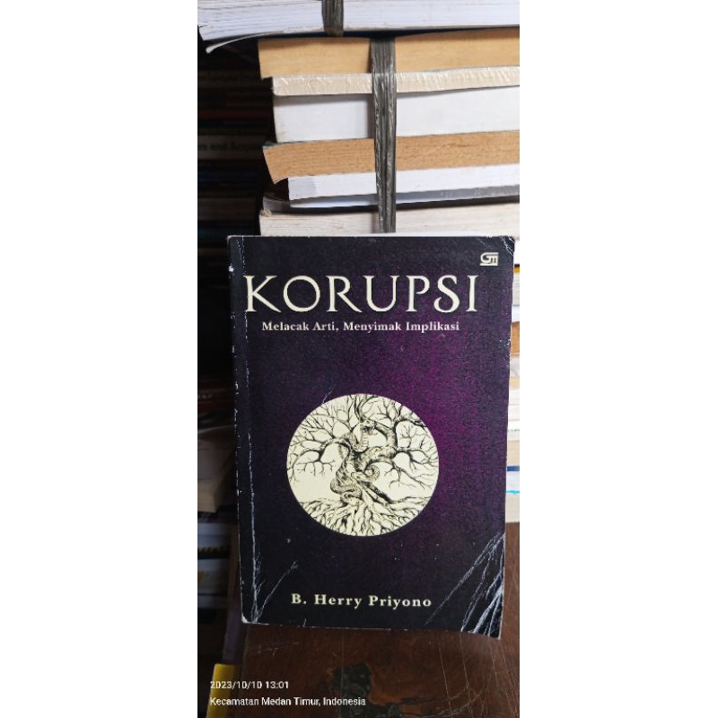 KORUPSI MELACAK ARTI MENYIMAK IMPLIKASI