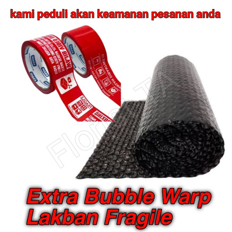 

Tambahan bubble wrap dan lakban fragile