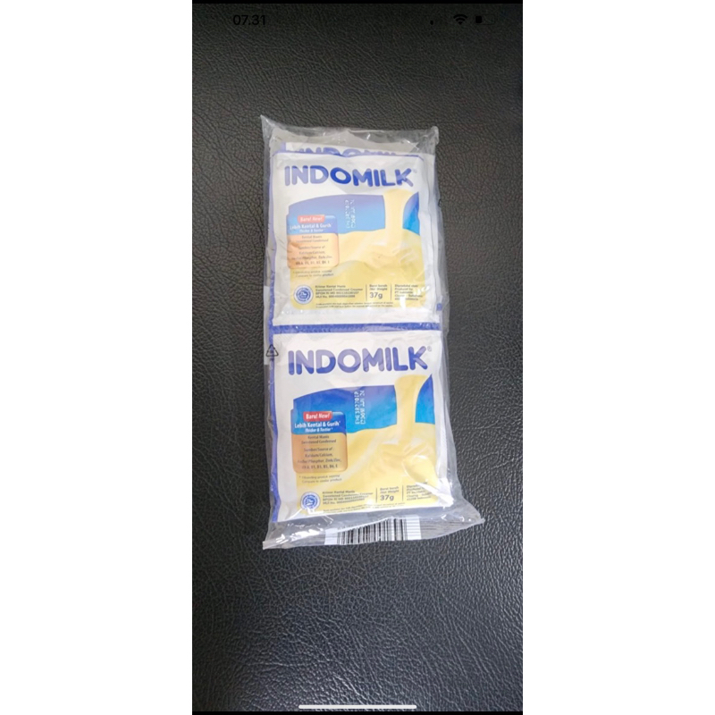 

Susu Kental Manis Indomilk Putih harga per pack (6sachet)