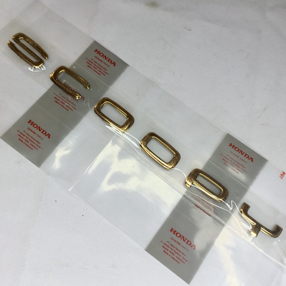 New emblem tulisan scoopy prestige terbaru gold tembaga 2022 kode part k2f original.