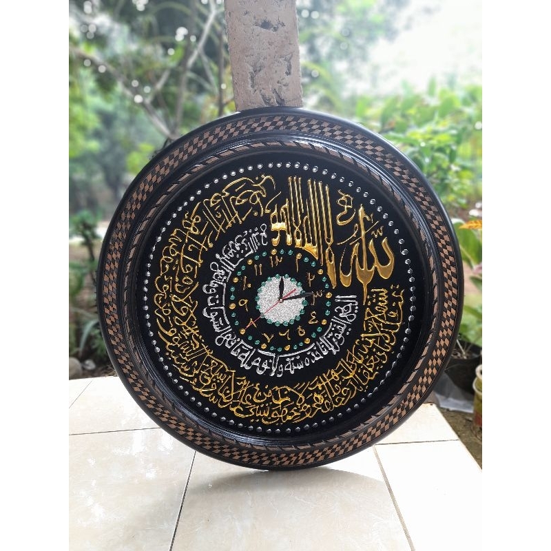 kaligrafi jam dinding diameter 75[ukuran besar] terbuat dari kayu jati asli jepara