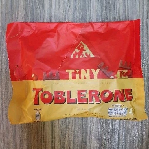 

Toblerone Tiny Mini coklat MILK CHOCOLATE honey almond IMPORT 200gr.