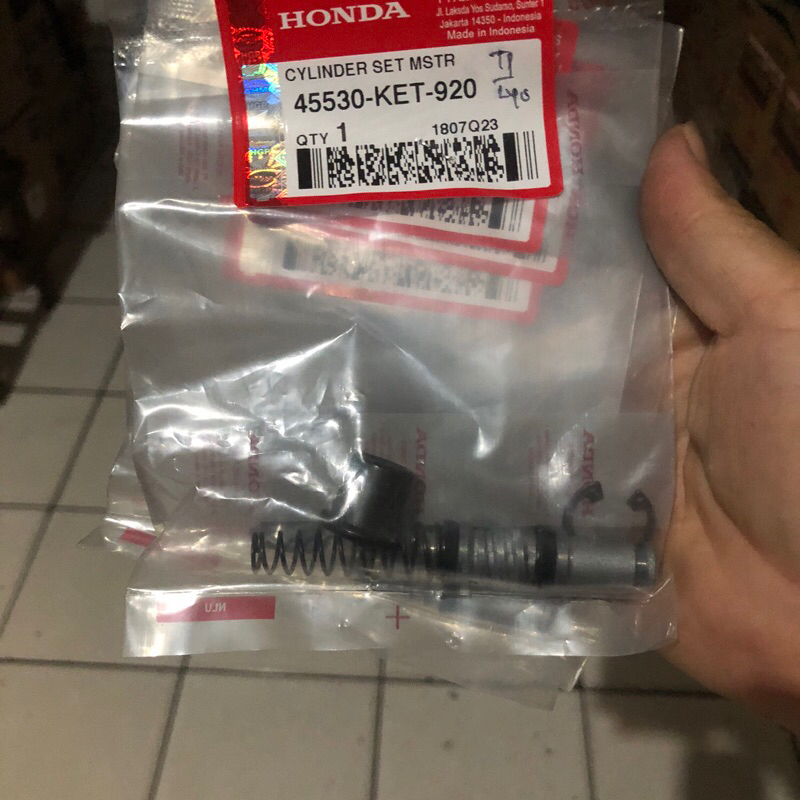 Seal sil master rem depan karisma Supra X 125 batman Revo100 original Honda