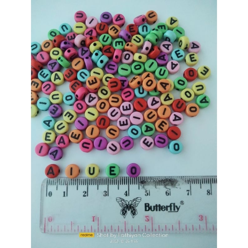 MANIK MOTE BULAT HURUF VOKAL
