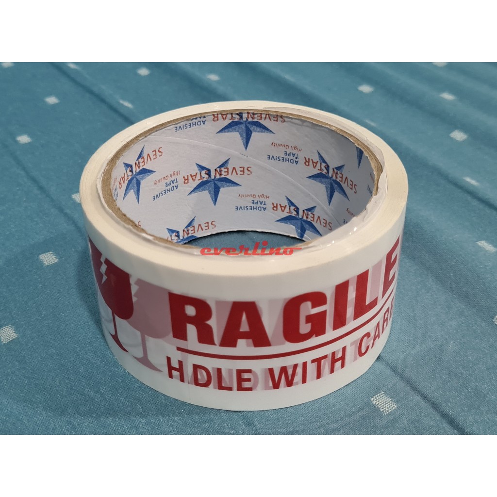 

berkah PUTIH - SECURITY SEAL - FRAGILE - HANDLE WITH CARE - JANGAN DIBANTING - SEVEN STAR Tape 48 mm x 45 m isolasi solasi selotip isolatip lakban plakban packing 48mm 2" 2 inch
