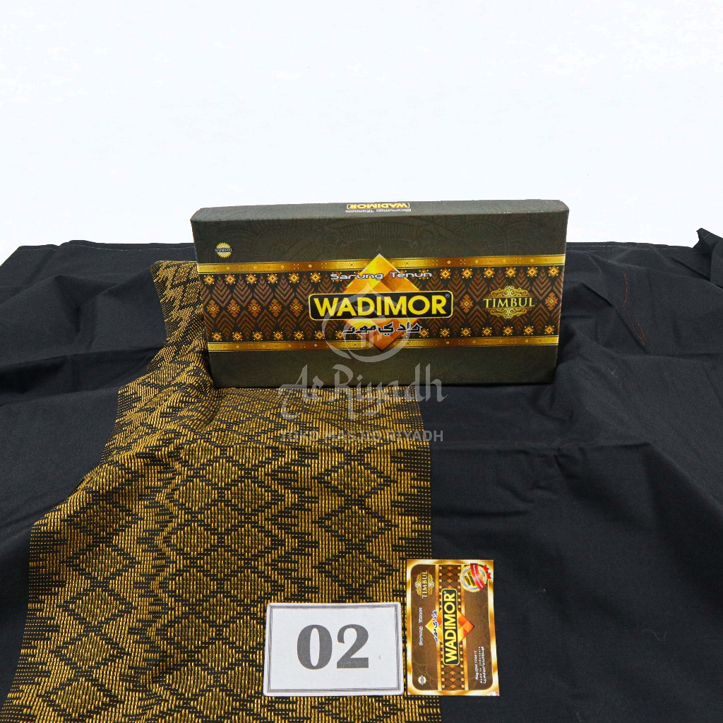 Sarung Wadimor Motif Timbul Polos Tumpal Hitam Putih Warna